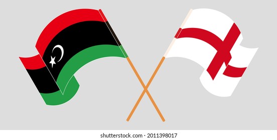 Gekreuzte und wehende Flaggen Libyens und Englands
