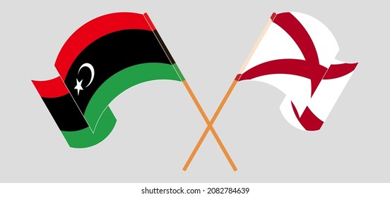 Crossed and waving flags of Libya and The State of Alabama. Vector illustration
