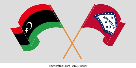 Crossed and waving flags of Libya and The State of Arkansas. Vector illustration
