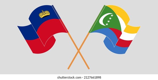 Crossed and waving flags of Liechtenstein and Comoros. Vector illustration
