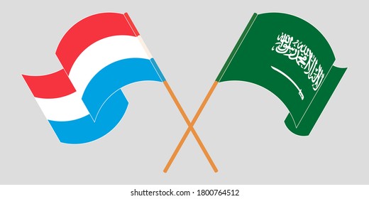 Crossed and waving flags of Luxembourg and the Kingdom of Saudi Arabia