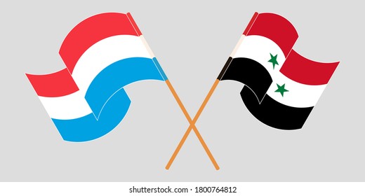 Crossed and waving flags of Luxembourg and Syria