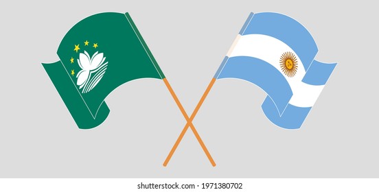 Crossed and waving flags of Macau and Argentina