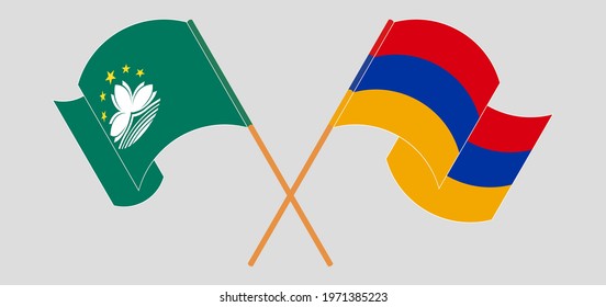 Crossed and waving flags of Macau and Armenia