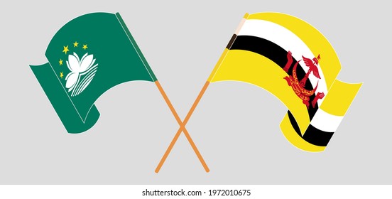 Crossed and waving flags of Macau and Brunei