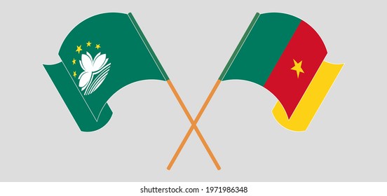 Crossed and waving flags of Macau and Cameroon