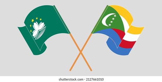 Banderas cruzadas y ondeando banderas de Macao y Comoras. Ilustración del vector
