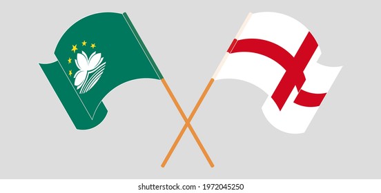 Crossed and waving flags of Macau and England