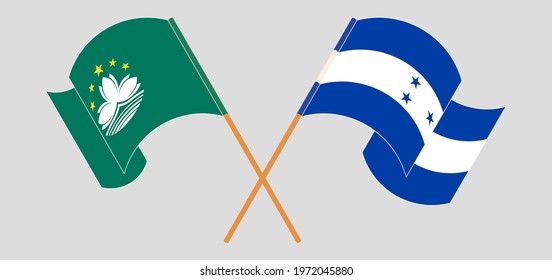 Crossed and waving flags of Macau and Honduras