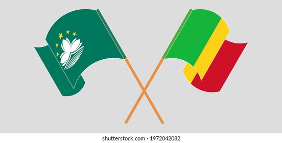 Crossed and waving flags of Macau and Mali