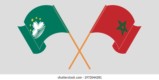Crossed and waving flags of Macau and Morocco