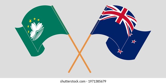 Crossed and waving flags of Macau and New Zealand