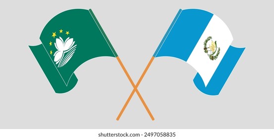 Crossed and waving flags of Macau and Republic of Guatemala. Vector illustration
