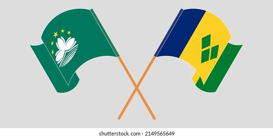 Crossed and waving flags of Macau and Saint Vincent and the Grenadines. Vector illustration