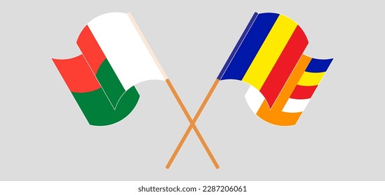 Crossed and waving flags of Madagascar and Buddhism. Vector illustration