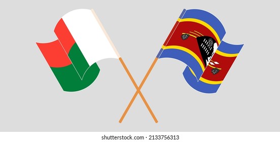 Banderas cruzadas y ondeando banderas de Madagascar y Eswatini. Ilustración del vector
