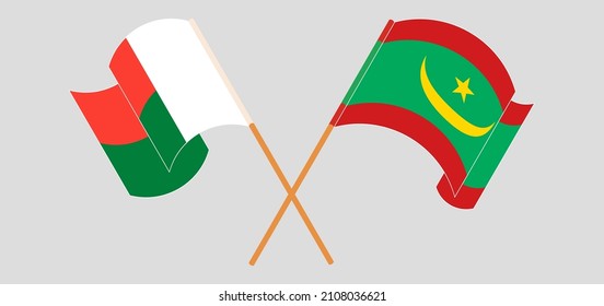 Cruzada y ondeando banderas de Madagascar y Mauritania. Ilustración del vector