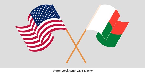 Crossed and waving flags of Madagascar and the USA. Vector illustration
