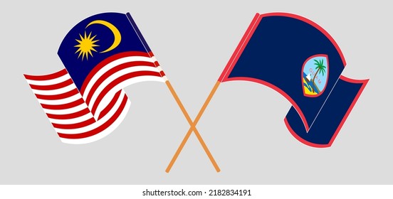 Crossed and waving flags of Malaysia and Guam. Vector illustration
