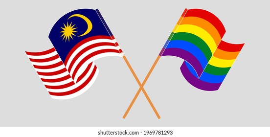 Crossed and waving flags of Malaysia and LGBTQ