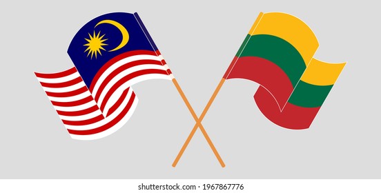 Crossed and waving flags of Malaysia and Lithuania