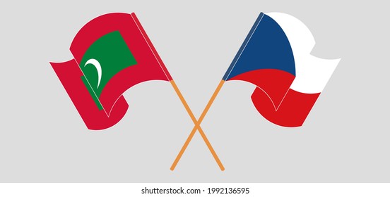 Banderas cruzadas y ondeando banderas de Maldivas y la República Checa