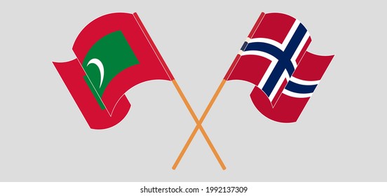 Crossed and waving flags of Maldives and Norway