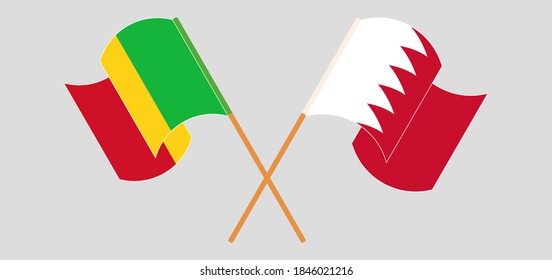 Crossed and waving flags of Mali and Bahrain