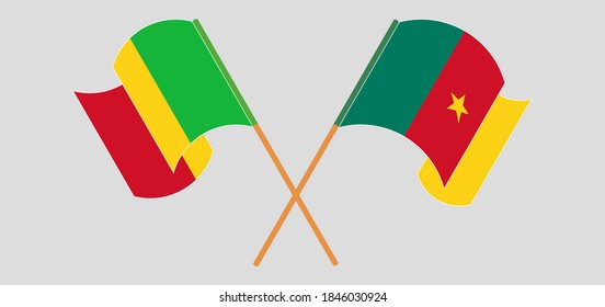 Crossed and waving flags of Mali and Cameroon