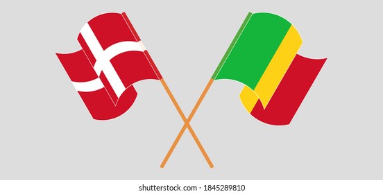 Crossed and waving flags of Mali and Denmark