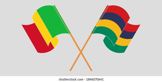 Banderas cruzadas y ondeando banderas de Malí y Mauricio