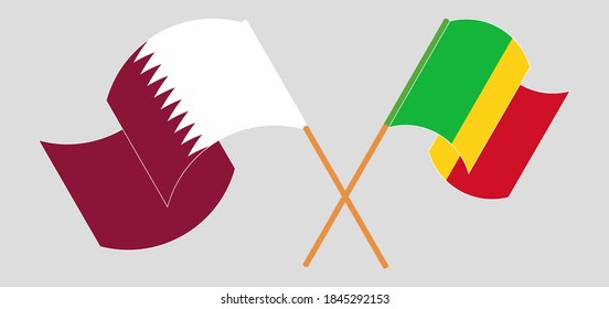 Crossed and waving flags of Mali and Qatar
