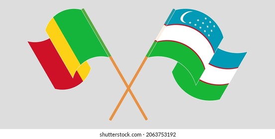 Crossed and waving flags of Mali and Uzbekistan