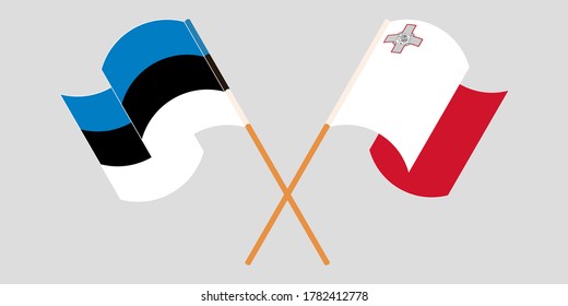 Crossed and waving flags of Malta and Estonia