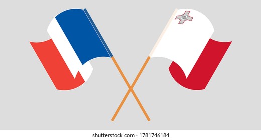 Crossed and waving flags of Malta and France