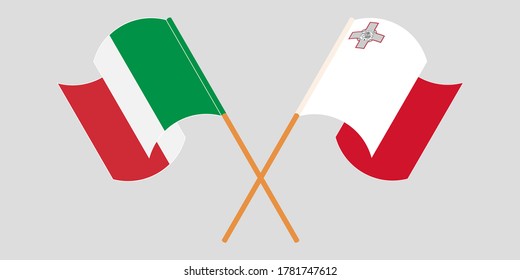 Crossed and waving flags of Malta and Italy