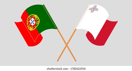 Crossed and waving flags of Malta and Portugal