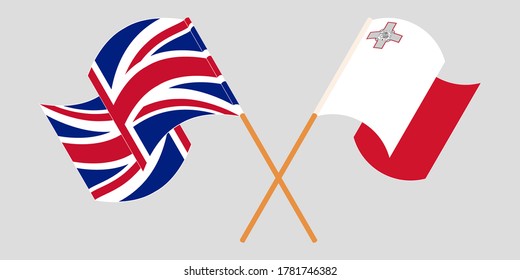 Banderas cruzadas y ondeando banderas de Malta y el Reino Unido