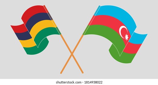 Crossed and waving flags of Mauritius and Azerbaijan