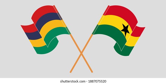 Crossed and waving flags of Mauritius and Ghana