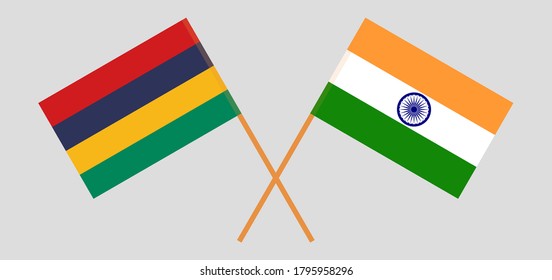 Gekreuzte und wehende Flaggen von Mauritius und Indien