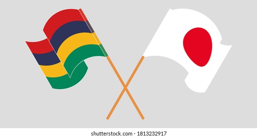 Crossed and waving flags of Mauritius and Japan