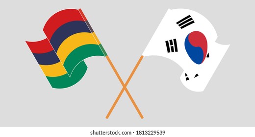 Crossed and waving flags of Mauritius and South Korea