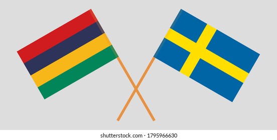 Crossed and waving flags of Mauritius and Sweden