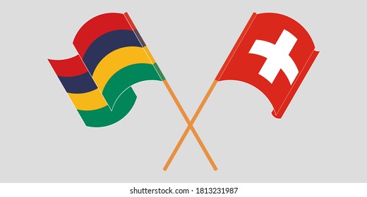 Crossed and waving flags of Mauritius and Switzerland