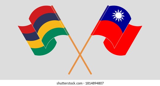 Crossed and waving flags of Mauritius and Taiwan