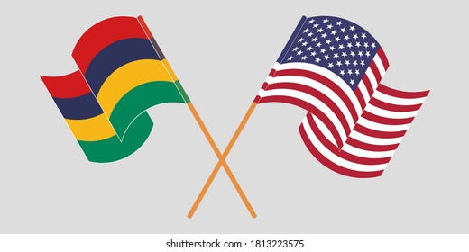 Crossed and waving flags of Mauritius and the USA