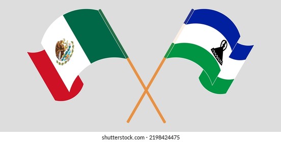 Crossed and waving flags of Mexico and Lesotho. Vector illustration
