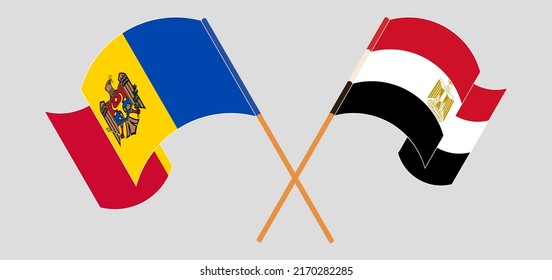 Crossed and waving flags of Moldova and Egypt. Vector illustration
