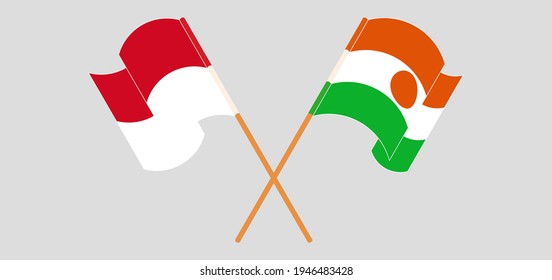 Crossed and waving flags of Monaco and Niger
